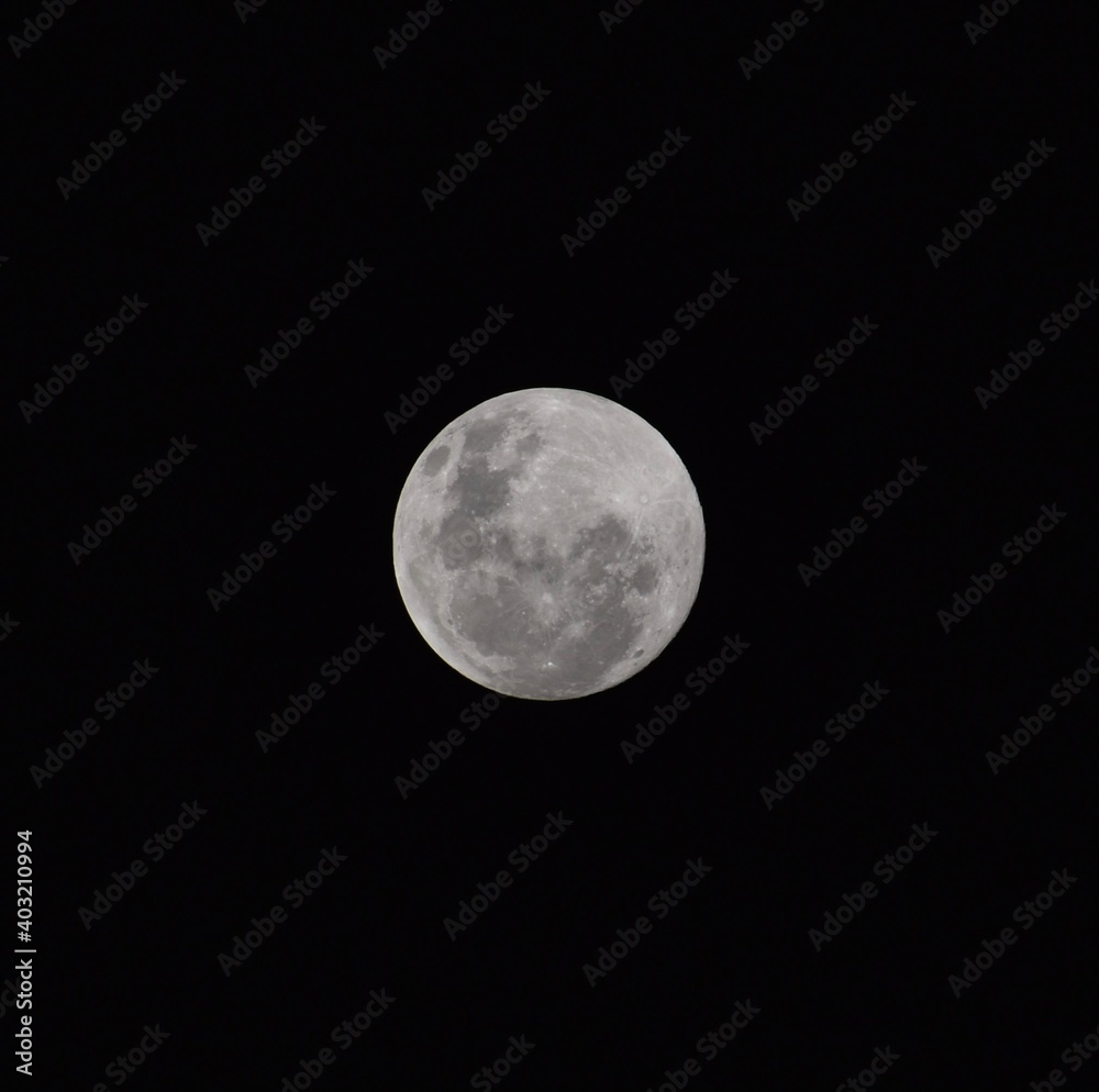 Close up of a full moon in a black sky Close up of a full moon in a black sky