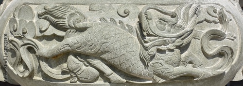 Stone carved dragon decoration outside a Chinese temple