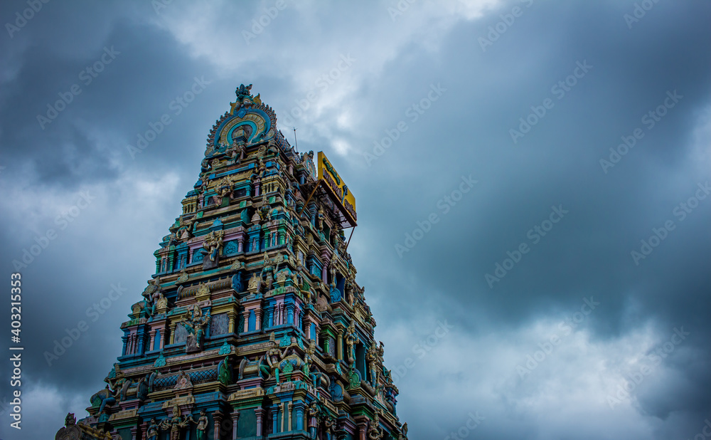 Beautiful view of the gopuram (tower) of Masani Amman Temple. (Translated from Tamil to English language as Maasani Mother). Located in Anaimalai, Pollachi, Coimbatore district of Tamil Nadu, India.