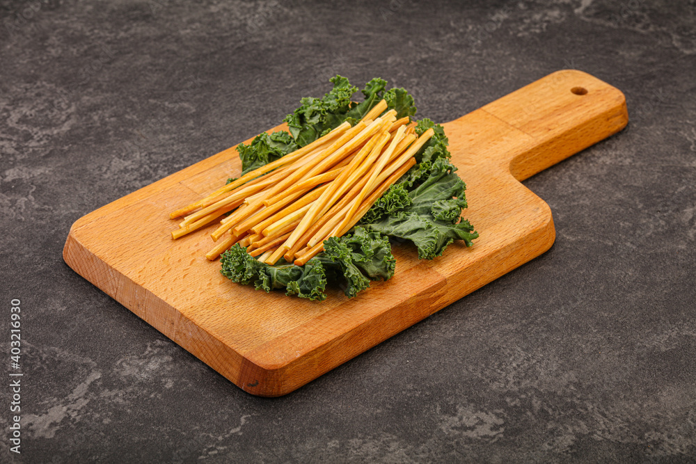 Chechel cheese sticks over board Chechel cheese sticks over board