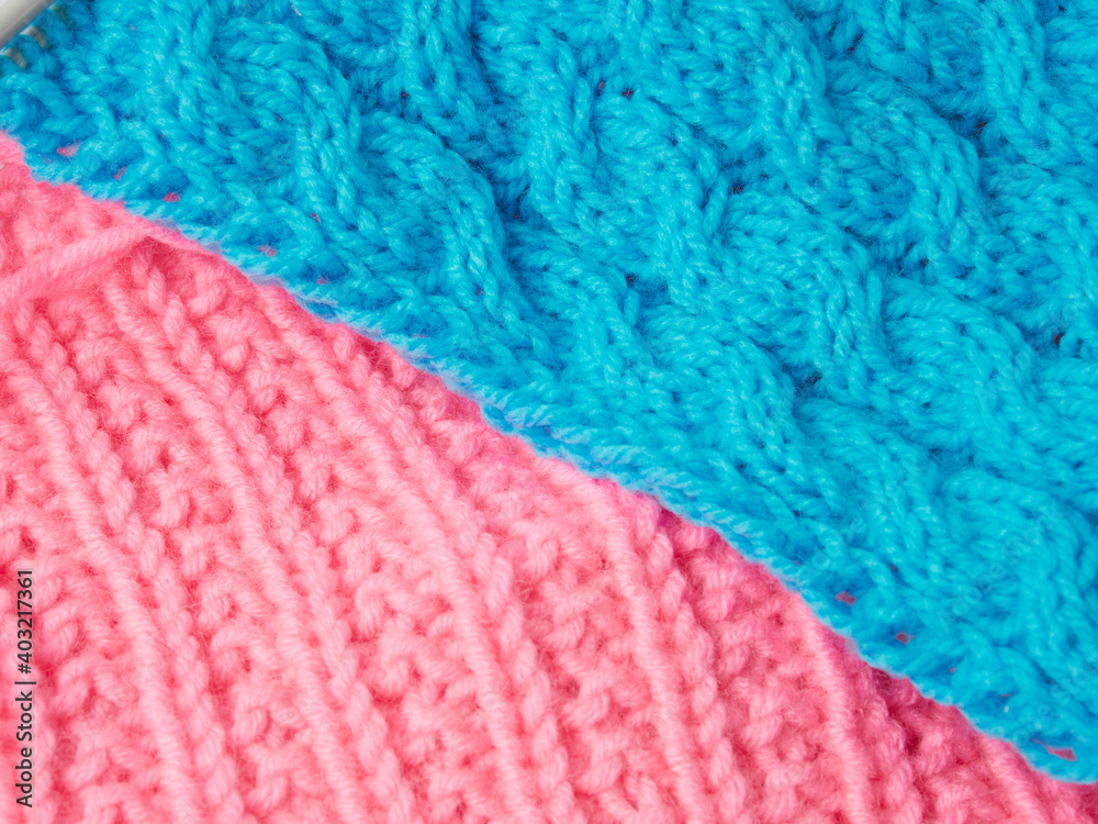 Needlework crochet, top view of yarn balls, flat spoon on light wood close-up Needlework crochet, top view of yarn balls, flat spoon on light wood close-up