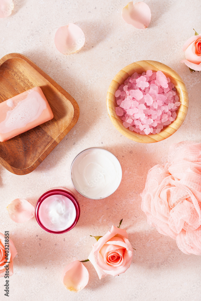 skincare products and rose flowers. natural cosmetics for home spa treatment skincare products and rose flowers. natural cosmetics for home spa treatment
