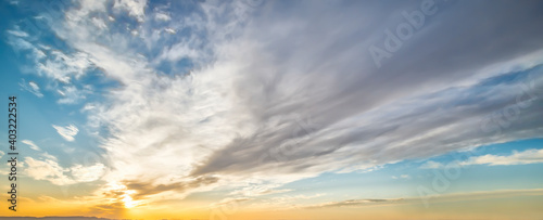 Stunning view of a dramatic sky with clouds at sunset. Natural background, wallpaper or preset with copy space. photo
