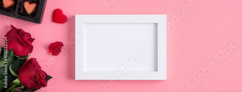 Valentine's Day memory with picture frame concept on pink background