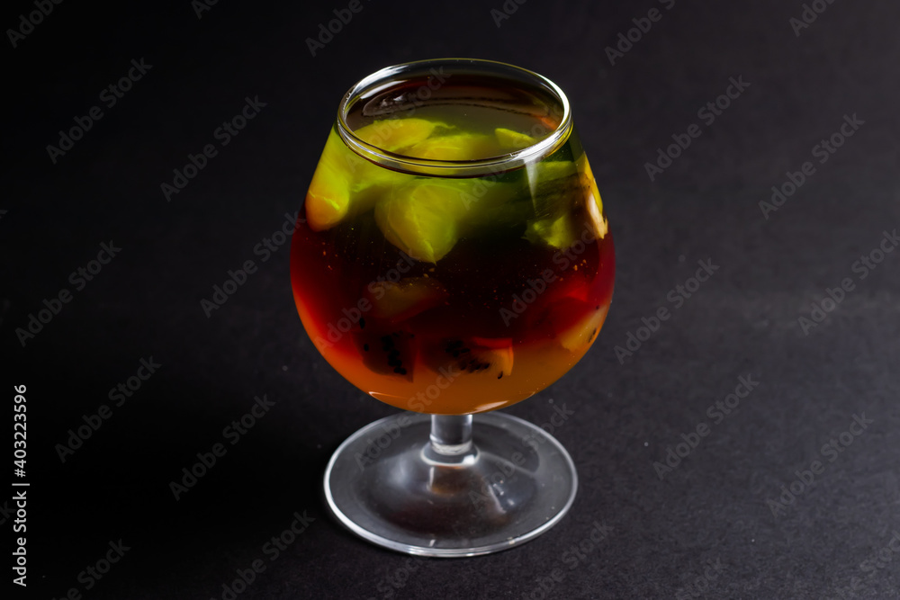Jelly with kiwi and fruits in a cup Jelly with kiwi and fruits in a cup