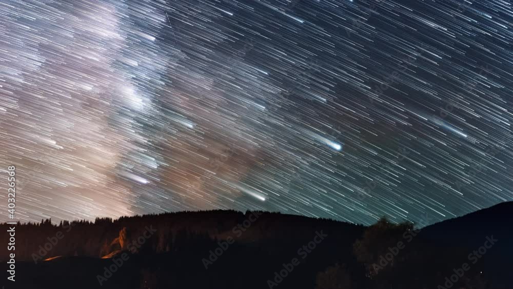 Timelapse of moving star trails in night sky. The Milky Way Galaxy ...