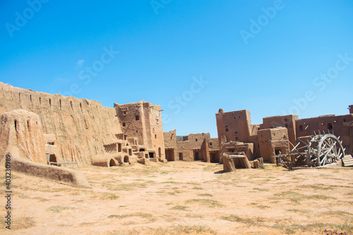 Old City. Clay houses. Houses made of wood. City of nomads Tatar-Mongols. Tatar-Mongol yoke. Movie scenery. Eastern city. Travels. Construction.