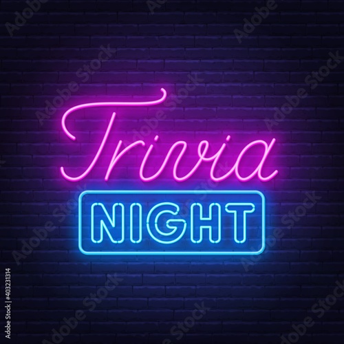 Trivia night neon sign on a brick wall .