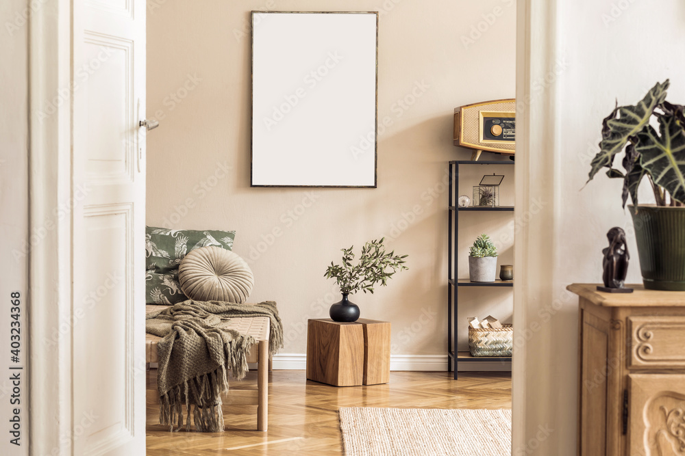 Interior design of korean style living room with modern chaise longue,  commode, shelf, wooden cube, retro radio, plants and elegant personal  accessories. Mock up paintings on the beige wall. Template Photos