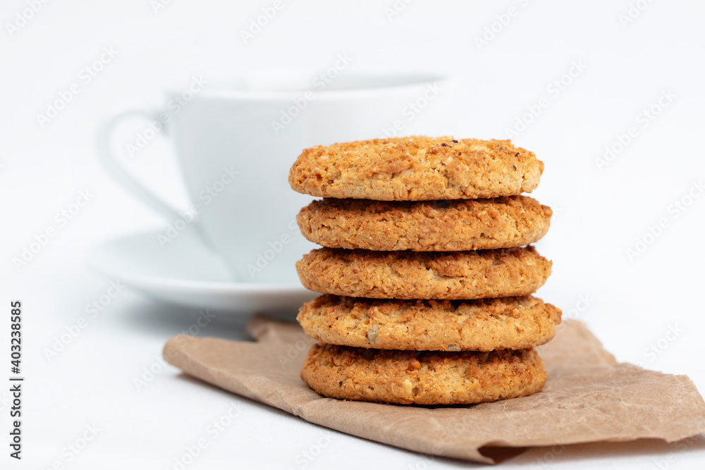 delicious cookies and a cup of coffee. Isolated on white background delicious cookies and a cup of coffee. Isolated on white background