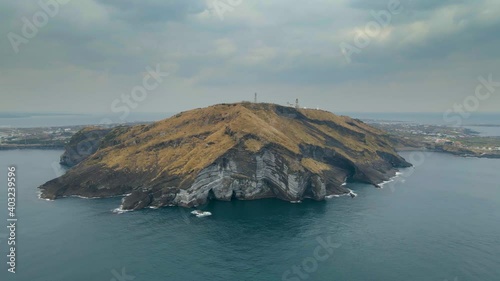 Counter-clockwise View of Udo Island with Soemeori Oreum in front, Jeju. photo