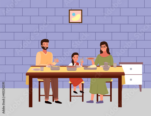 People are eating indian food at cafe. Family is sitting together and tasting traditional dishes outdoors. Dining table with pita and tomato soup. People in national costumes with indian meals
