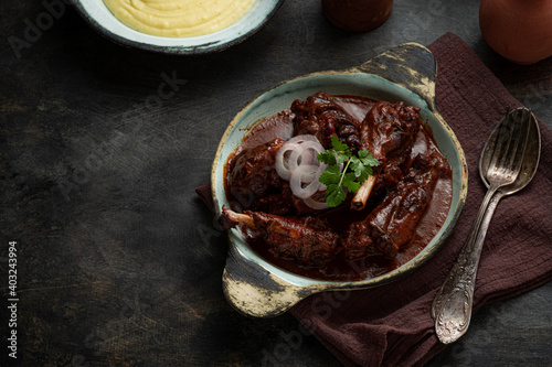 Bild auf Leinwand coq au vin, red wine braised chicken, french cuisine