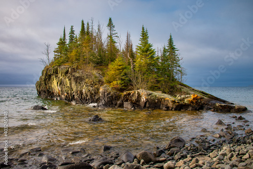 A beautiful island called Tombolo on the North Shore of Lake Superior. Rocky shoreline in Minnesota, USA, North America 