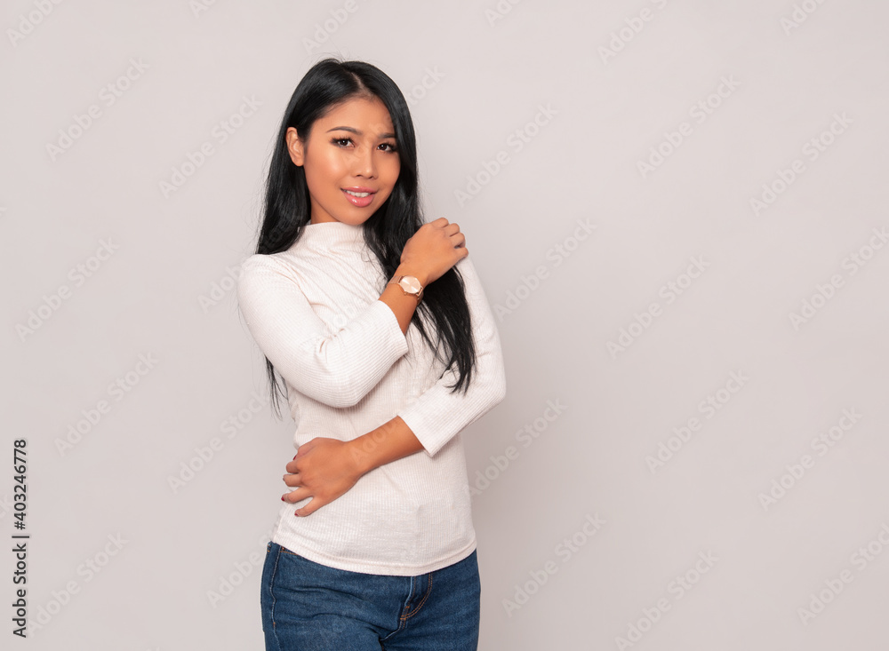 Beautiful young asian woman with long black hair wearing wrist watch Beautiful young asian woman with long black hair wearing wrist watch