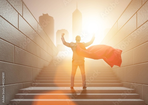 Businessman superhero successful in career ladder concept photo