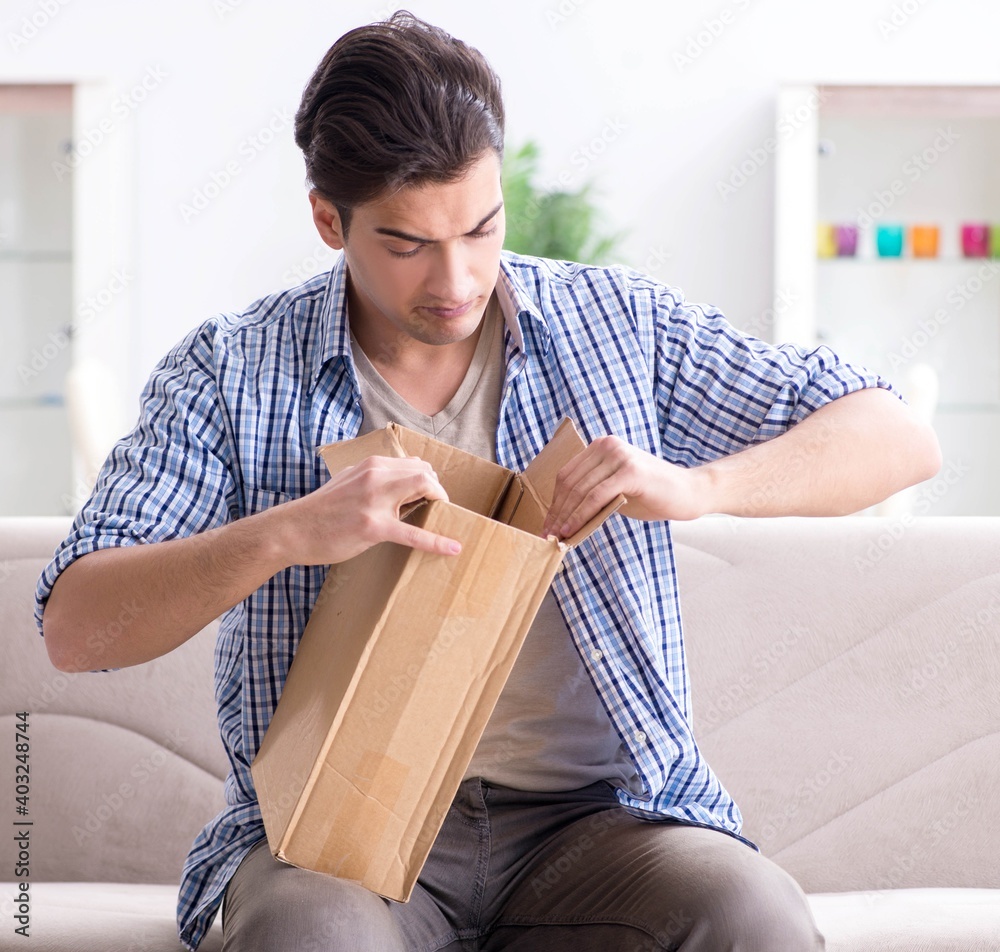 Man receiving empty parcel with stolen goods Man receiving empty parcel with stolen goods