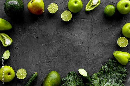 Frame of vegetarian food - green vegetables: cucumbers, broccoli, avocado
