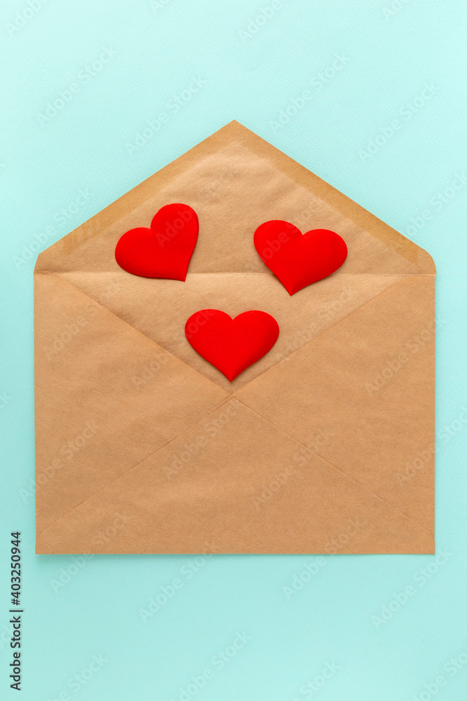 Red heart falling out of the open envelope. Love letter for valentine's day