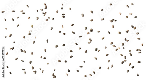 Close up of chia seeds falling spread in the full frame and isolated on white background photo