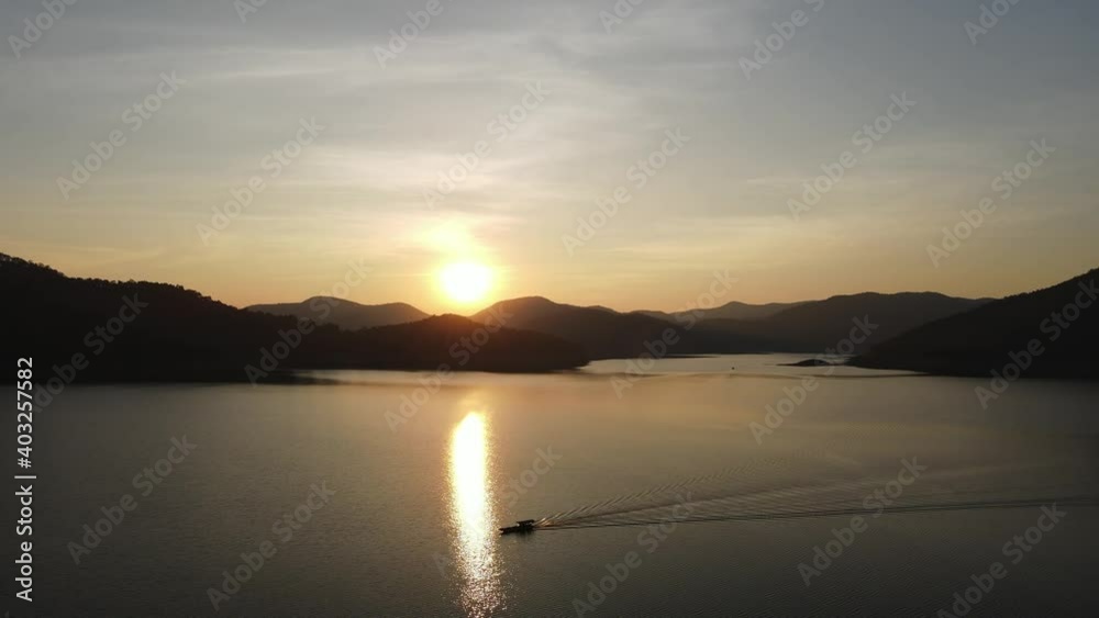 boat sail over the lake sunset boat sail over the lake sunset