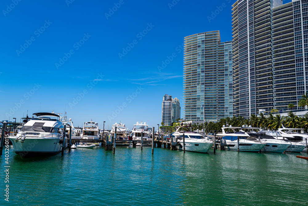 Beautiful city in Florida USA. Skyscrapers and yachts on Miami Beach.