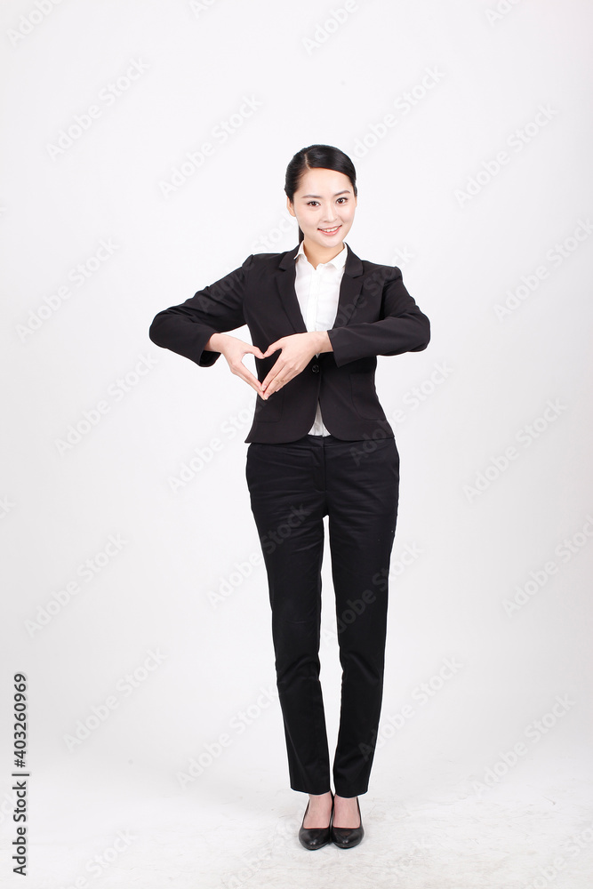 A young business woman in a suit A young business woman in a suit