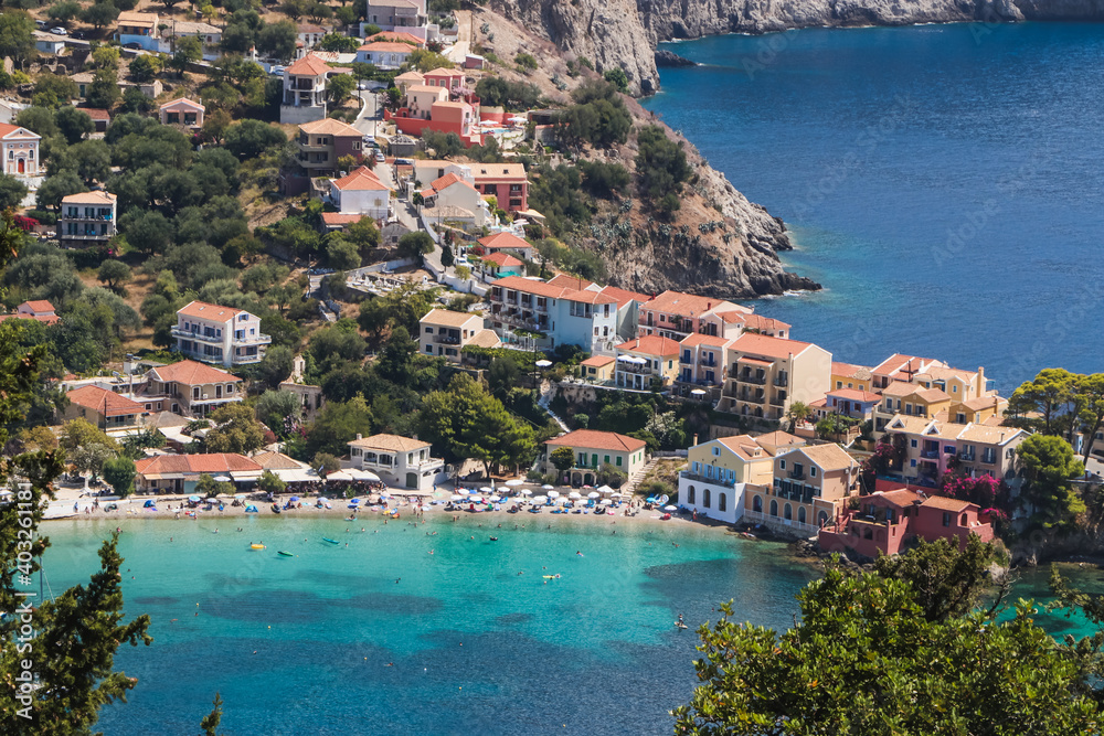 Beautiful panorama from above of the village of Assos in Kefalonia, on a sunny summer day, with perfect views of the houses of the village and its small beach Tourist place of Greece.