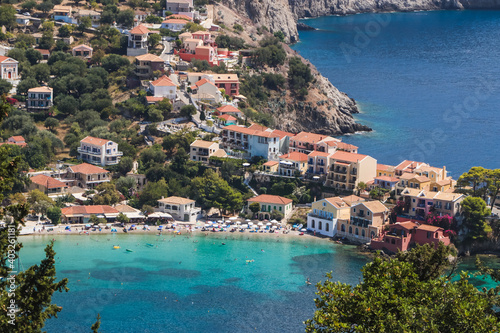 Beautiful panorama from above of the village of Assos in Kefalonia, on a sunny summer day, with perfect views of the houses of the village and its small beach Tourist place of Greece.