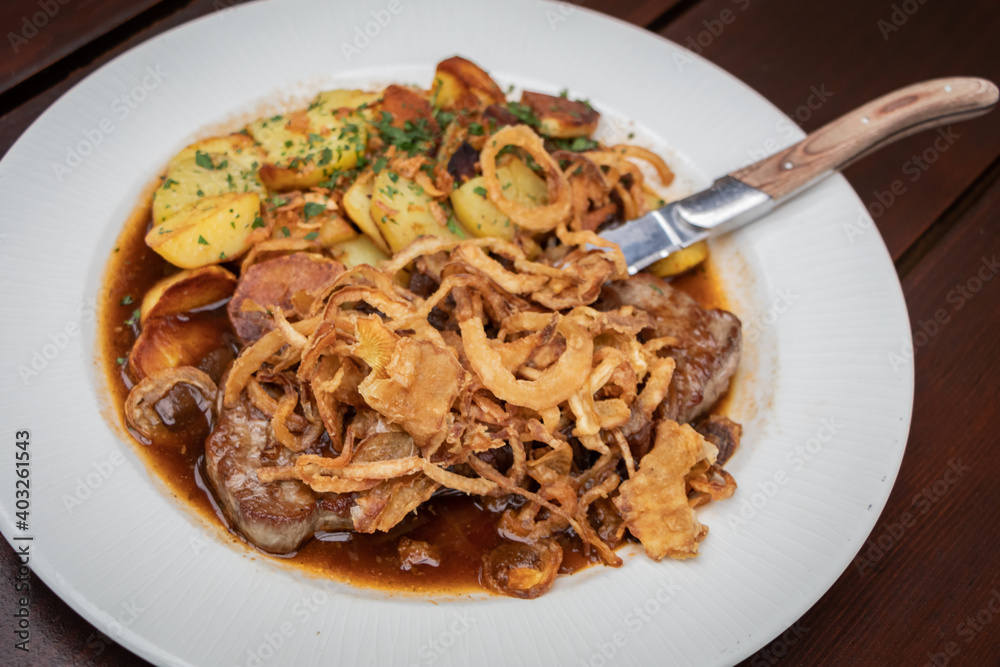 zwiebelrostbraten, typical German dish. top view. zwiebelrostbraten, typical German dish. top view.