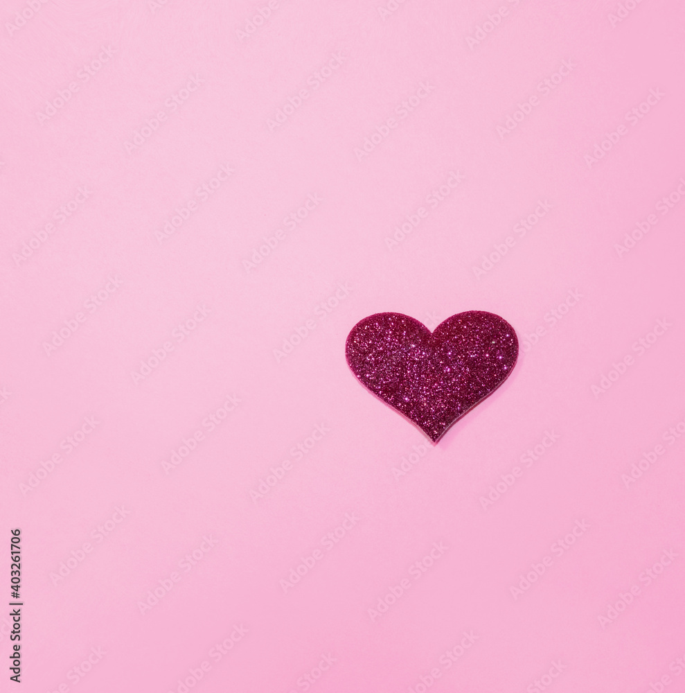 Pink shiny heart for valentine's day isolated on pink background. Glitter and sparkles hearts. Expensive ornate banner. Valentine's day background