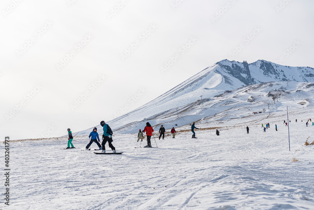 People skiing on the ski slope. Kayseri, Panoramic view of Erciyes,Turkey.
