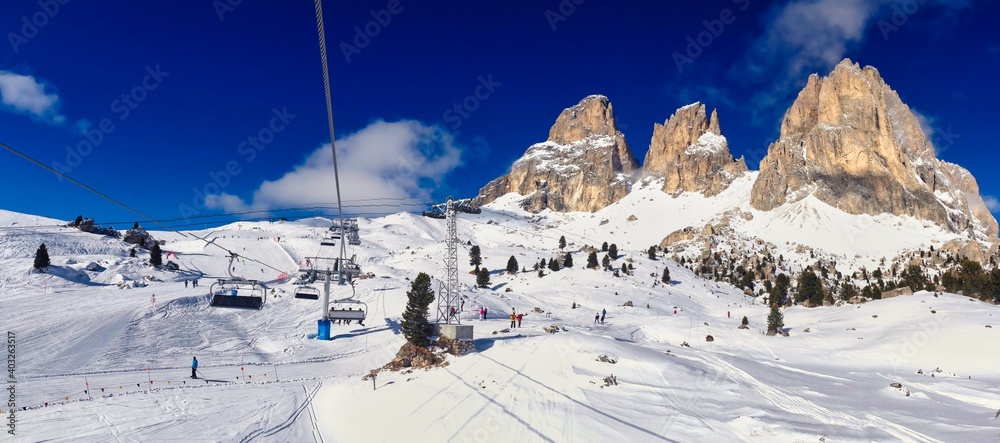 Winter Panorama of Ski Slope and Snowy Rock in Selva Di Val Gardena in Italian Dolomites. Beautiful Winter Scenery in Italy.