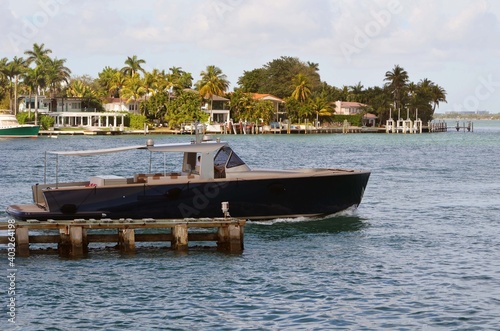High-end motor boat cruising off of the Venetia Causeway in Miami Beach,Florida.