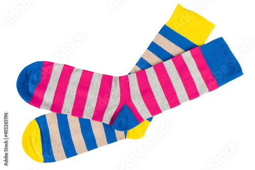 Pair socks with different lines isolated on white background. Colorful socks son white background. Colored socks on the leg isolated on white background