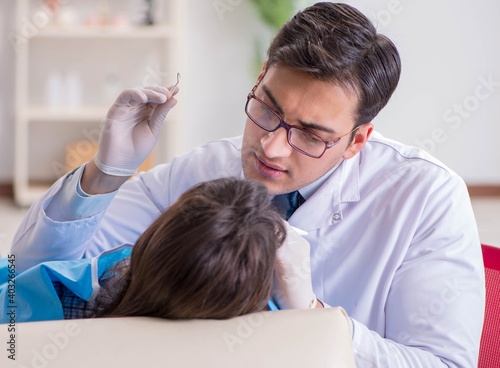 Patient visiting dentist for regular check-up and filling