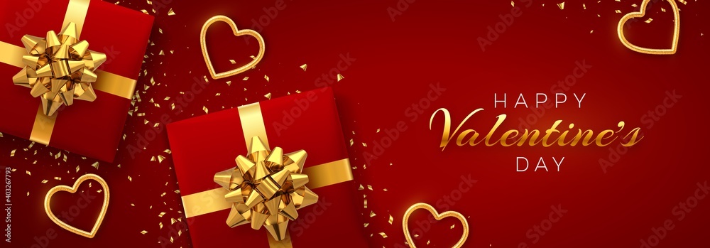 Happy Valentine's Day banner template. Realistic gift boxes with golden bow, and shining red and gold hearts with glitter texture and confetti on red background. Top view. Vector illustration.