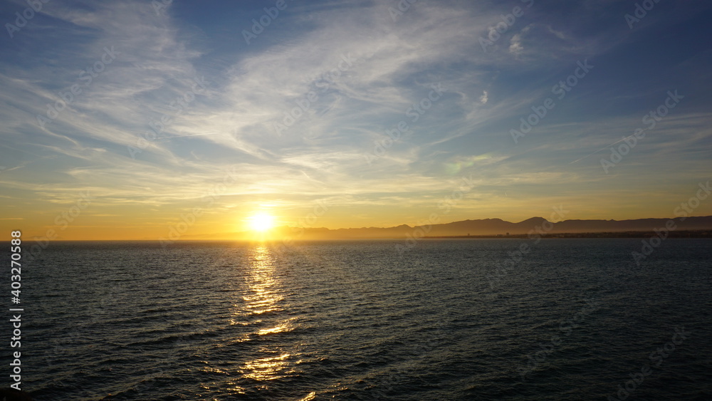 sunset over the mountains near the sea sunset over the mountains near the sea