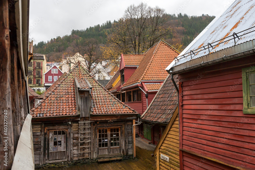 Old wooden warehouses in Bellgården, an ancient passageway in Bryggen, Bergen, Hordaland, Norway: a UNESCO World Heritage Site Old wooden warehouses in Bellgården, an ancient passageway in Bryggen, Bergen, Hordaland, Norway: a UNESCO World Heritage Site