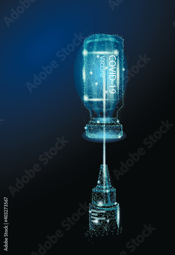 Small vaccine bottle (phial) with a label that read "Covid - 19 Corona virus Vaccine injection only" & a medical syringe isolated on black Vaccination for prevention, immunization & treatment to virus
