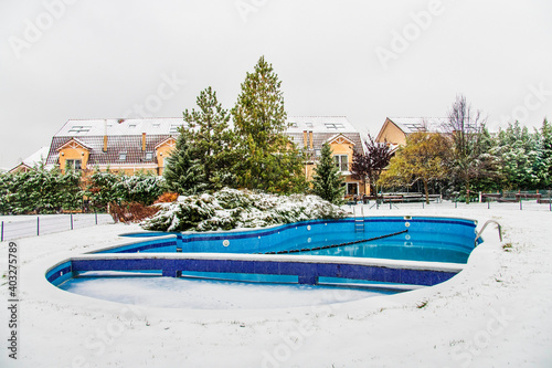 Snow covered yard in a beautiful neigborhood in Bucharest.Christmas landscape
