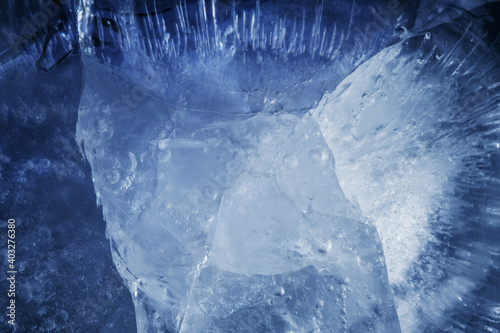 Photography beautiful blue ice with cracks. frosty background