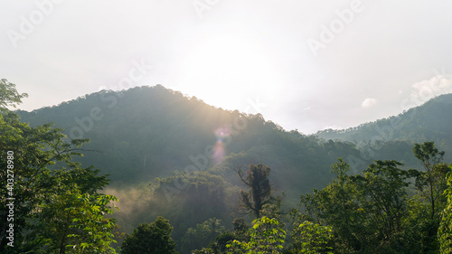 Mountain range with visible silhouettes through the morning colorful fog, Bright and enjoy your eye with the sky refreshing in Phuket Thailand.