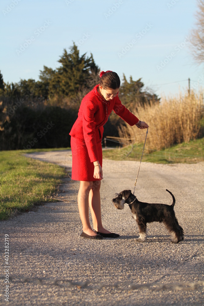 woman with dog schnauzer miniature woman with dog schnauzer miniature