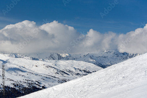 Mountains in the Pyrenees in Andorra in winter with lots of snow © martinscphoto
