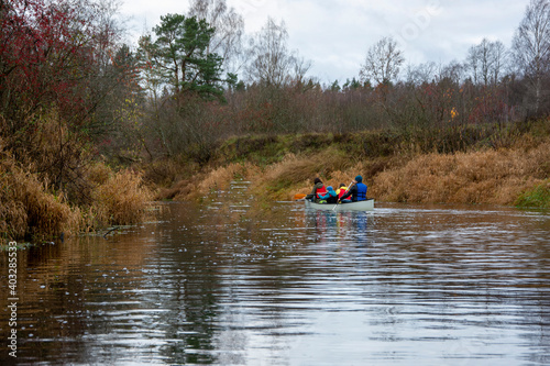 family on canoe