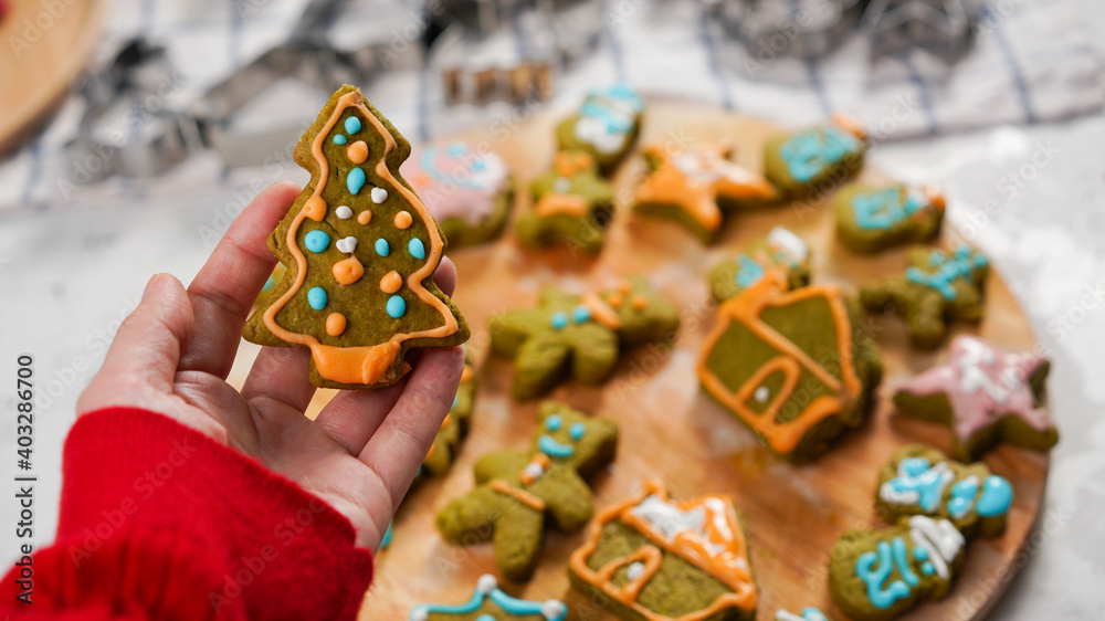 Green ginger bread cookies homemade cooking for Christmas traditional dessert. Kids and family love to prepare green tea cookies. Celebration cookies for Christmas. Green ginger bread cookies homemade cooking for Christmas traditional dessert. Kids and family love to prepare green tea cookies. Celebration cookies for Christmas.