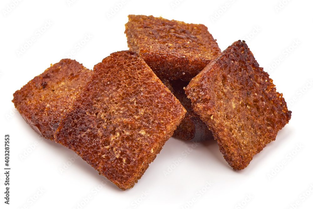 Rye bread croutons with garlic, isolated on white background Rye bread croutons with garlic, isolated on white background