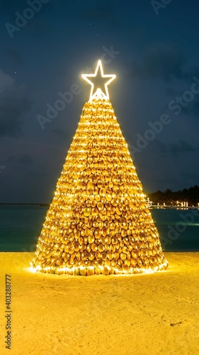 Christmas Tree in Maldives with lights and stars 
