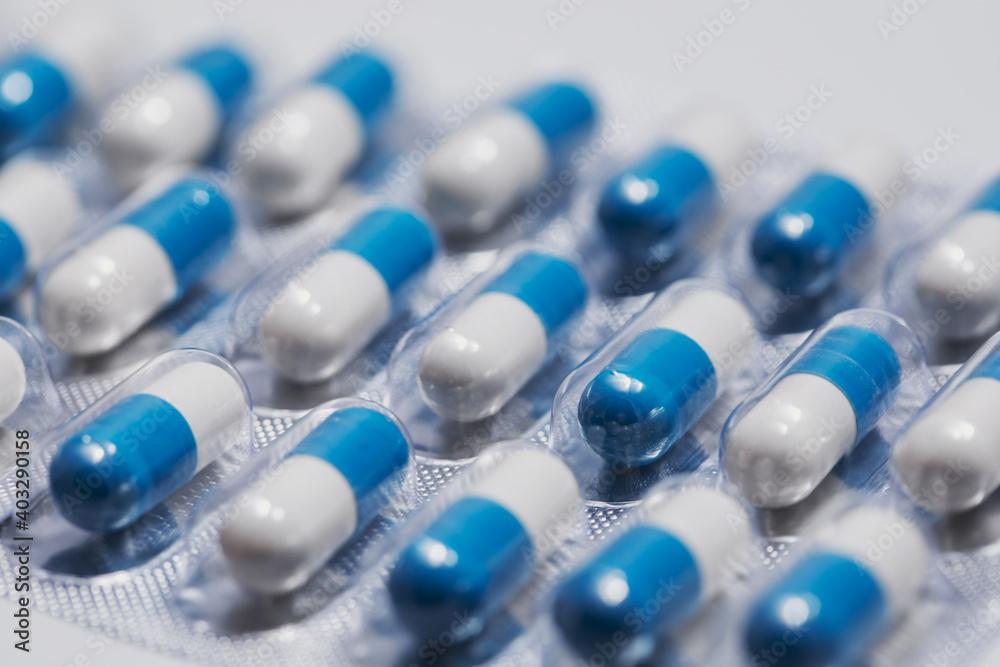 The medicine is in the form of blue and white capsules. The medicine is in the form of blue and white capsules.